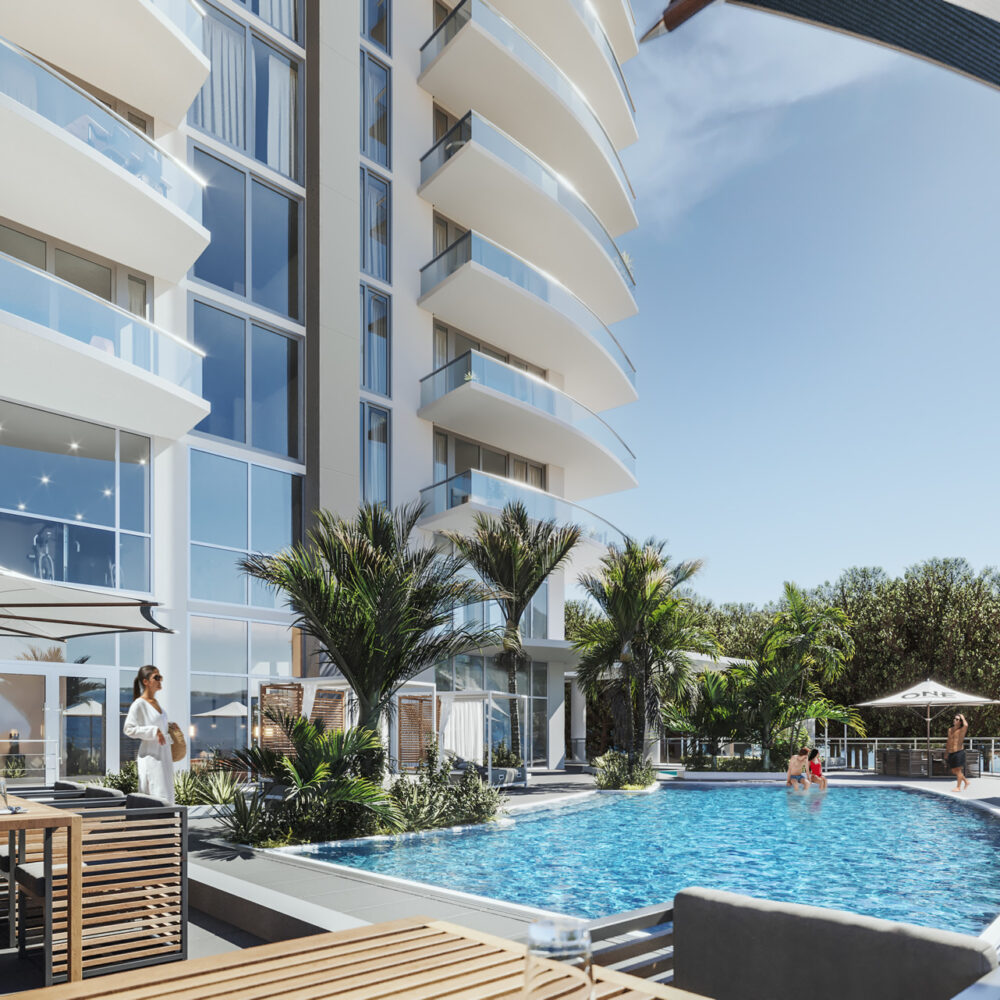 Expansive Pool Deck with Shaded Lounge Chairs and Cabanas